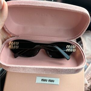 Miu Miu 06ZS Black Oval Sunglasses Gold Miu Miu  (item #190)